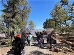 students walking the path of time at the grand canyon